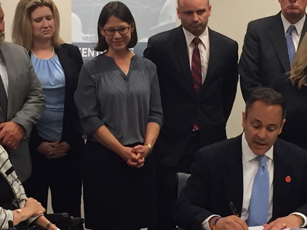Governor Bevin signing Executive Order about Employment First, including Katie Wolf Whaley