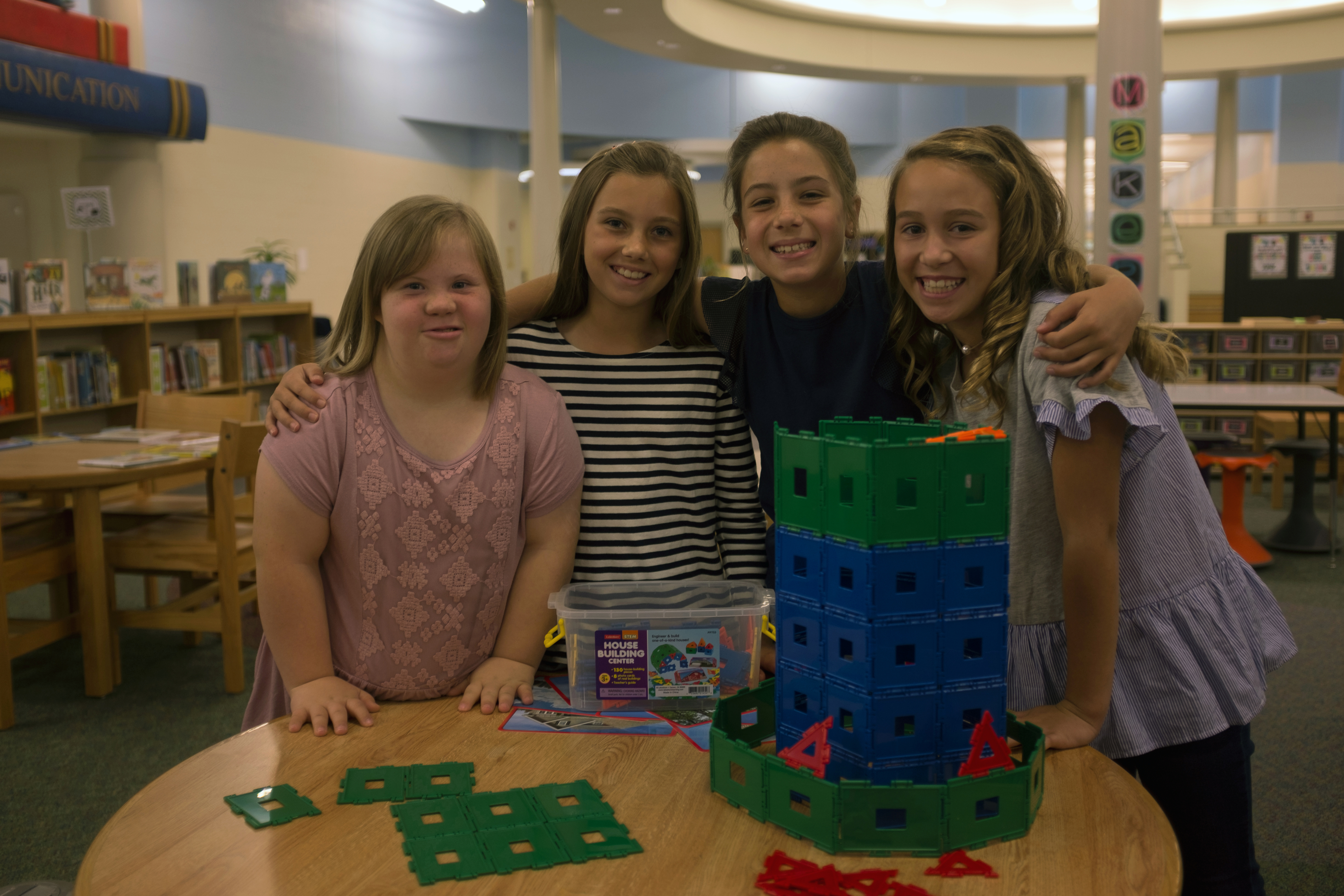 Girls at elementary school, including student with Down syndrome