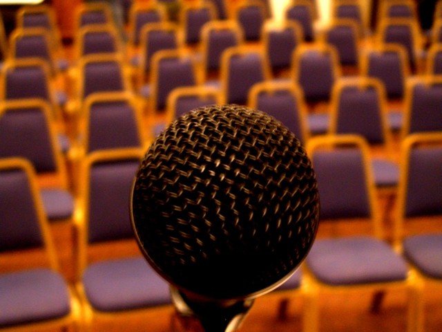 microphone with chairs in the foreground