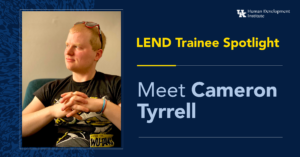Meet Cameron Tyrrell: He has short blonde hair and is wearing a black t-shirt looking to the side